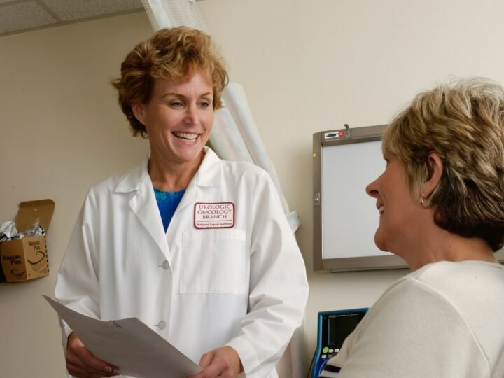 A doctor talking with a patient
