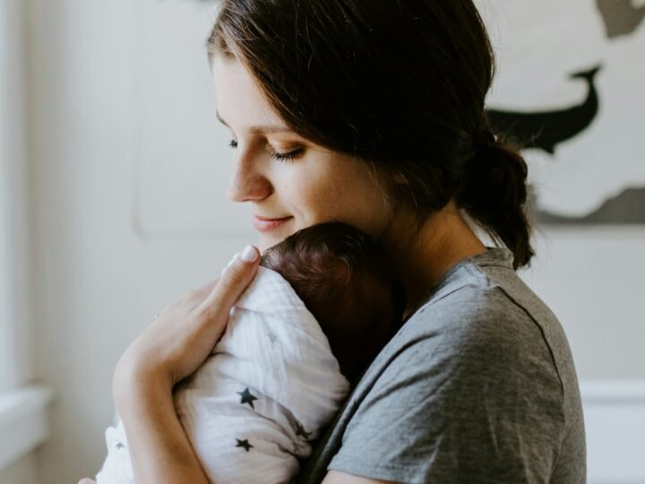 Mother holding her newborn baby